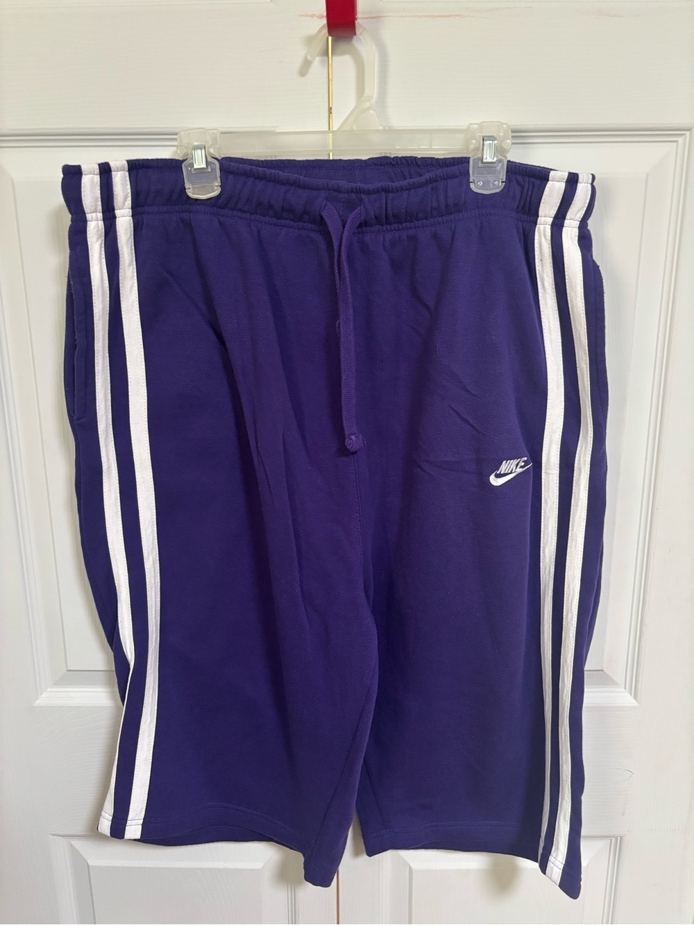 Nike Purple Athletic Shorts with White Side Stripes